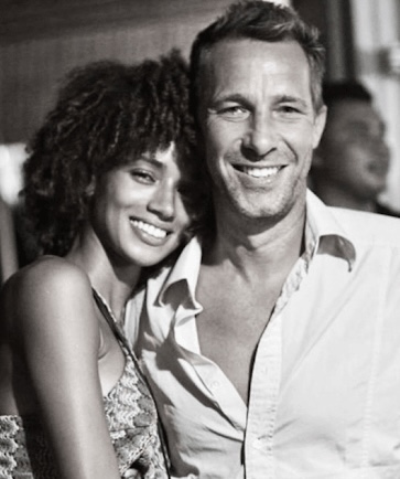 Josh Forrow and Tarah Rodgers — a black and white portrait of the couple, both smiling, taken at Ulu Cliffhouse around the time of their April 2025 wedding